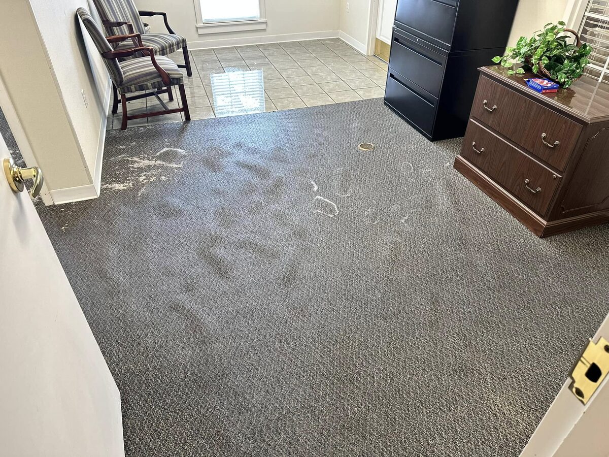 Soiled office carpet before cleaning, from a Duval Floor Care Facebook job photo